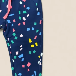 Pantalón jogger niña azul marino estampado confeti